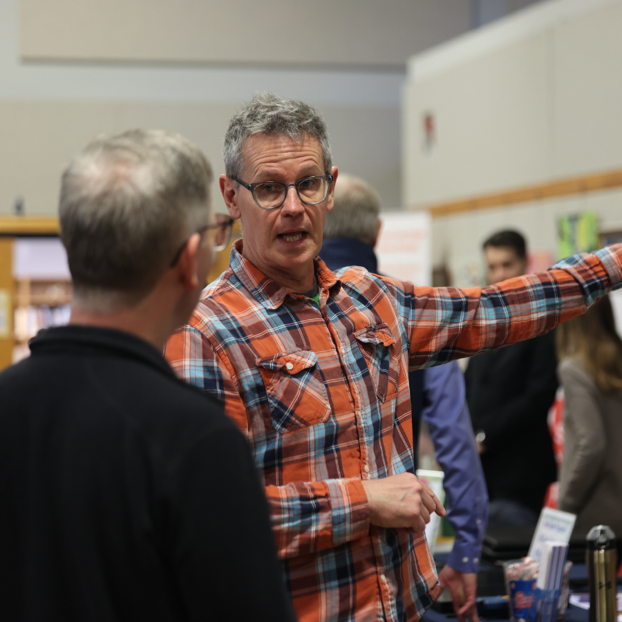 two people at the sustainable home expo