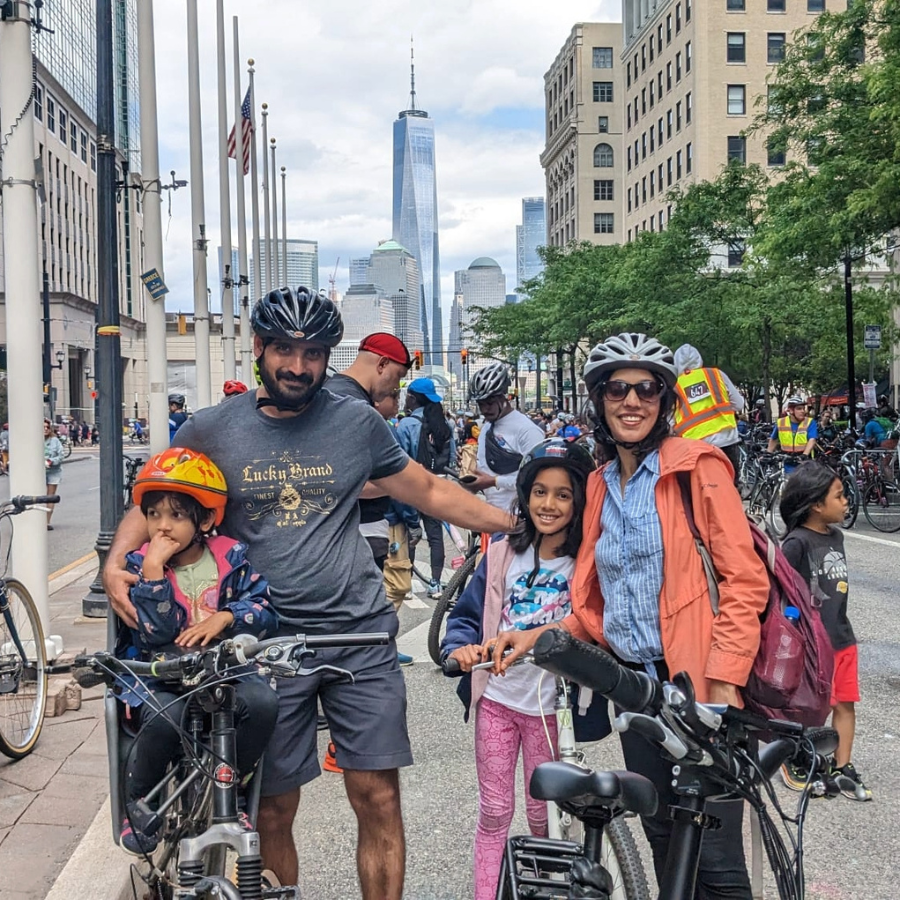 family on bikes in the city